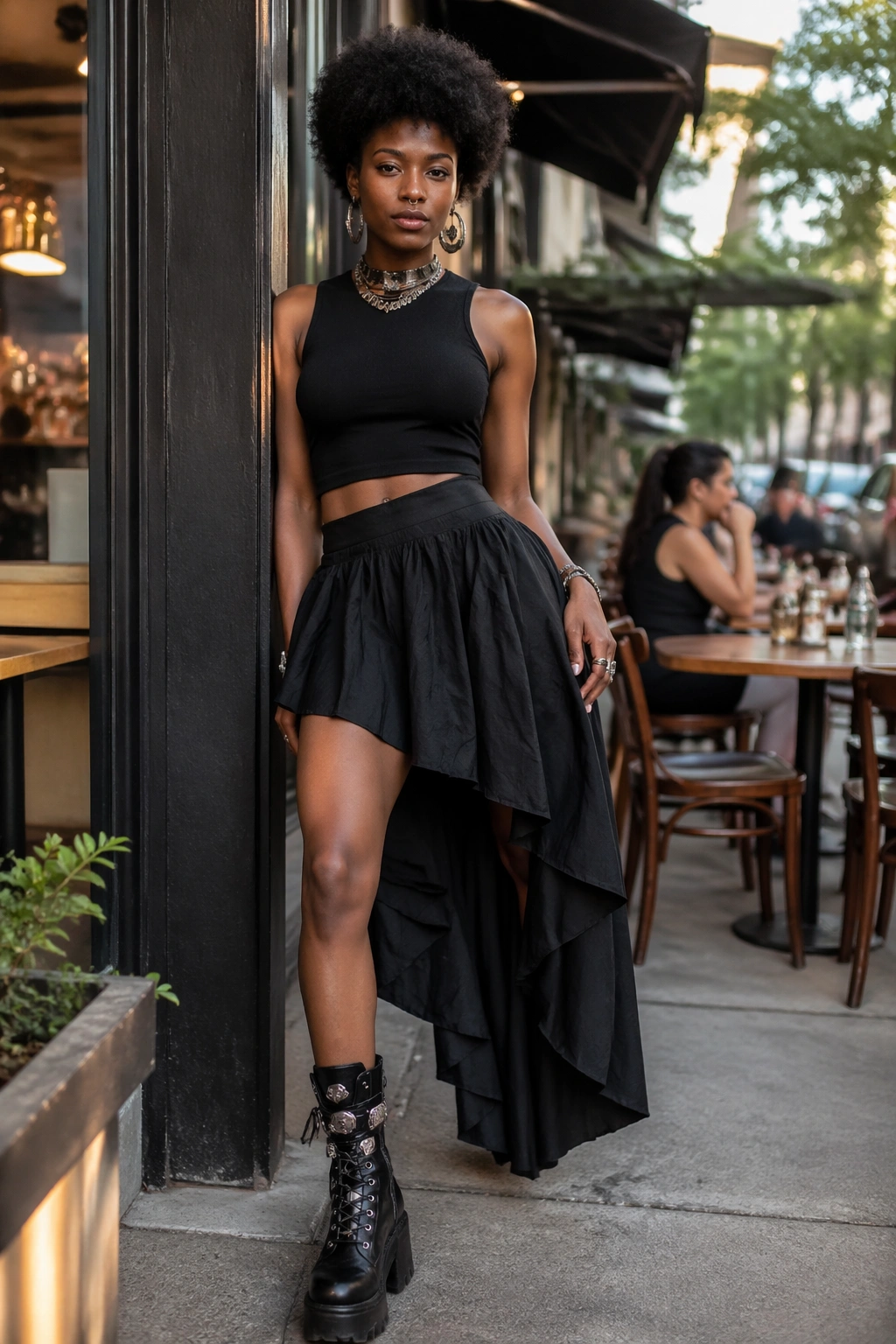 Mid-shot of a person wearing an asymmetrical hem skirt and bold boot on the shorter side in a street setting