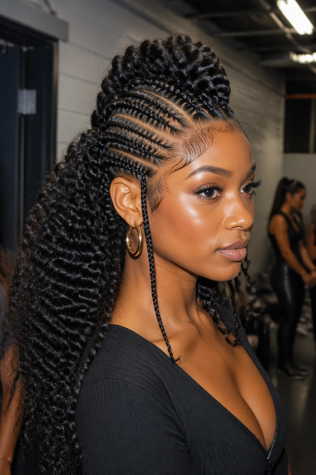 Close-up of a real woman with a braided mohawk half up half down