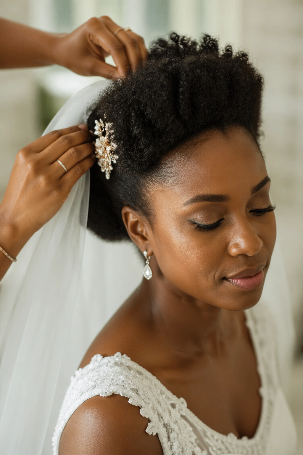 Bride at trial with veil being adjusted, hair tested for wedding day.