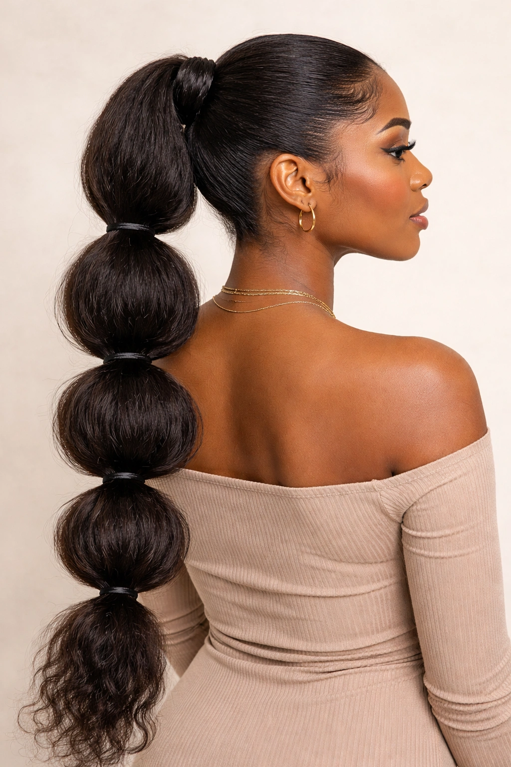 Bubble ponytail with added hair extension blended with natural hair