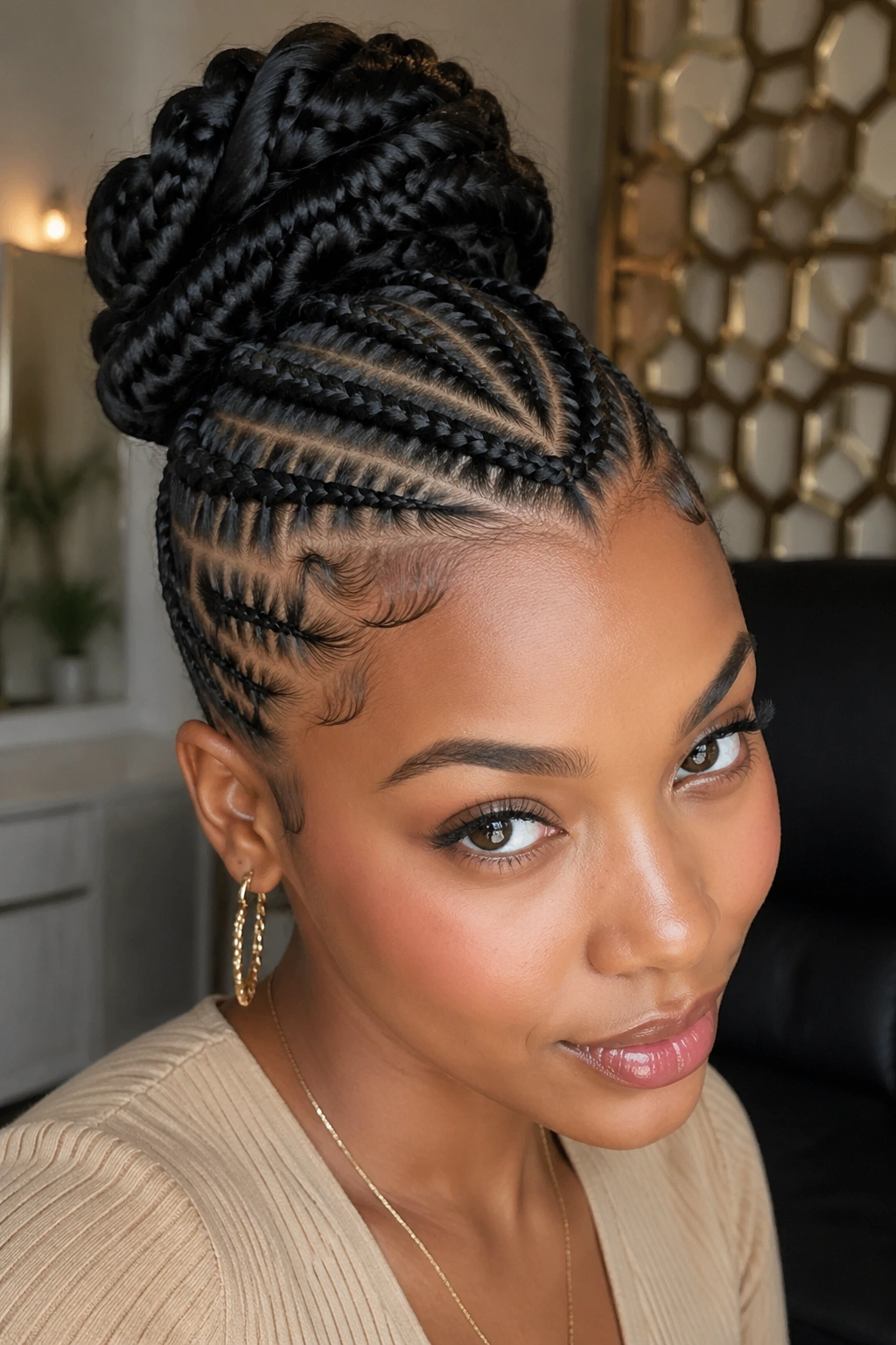 Close-up of a real person with cornrow bangs and crown bun.