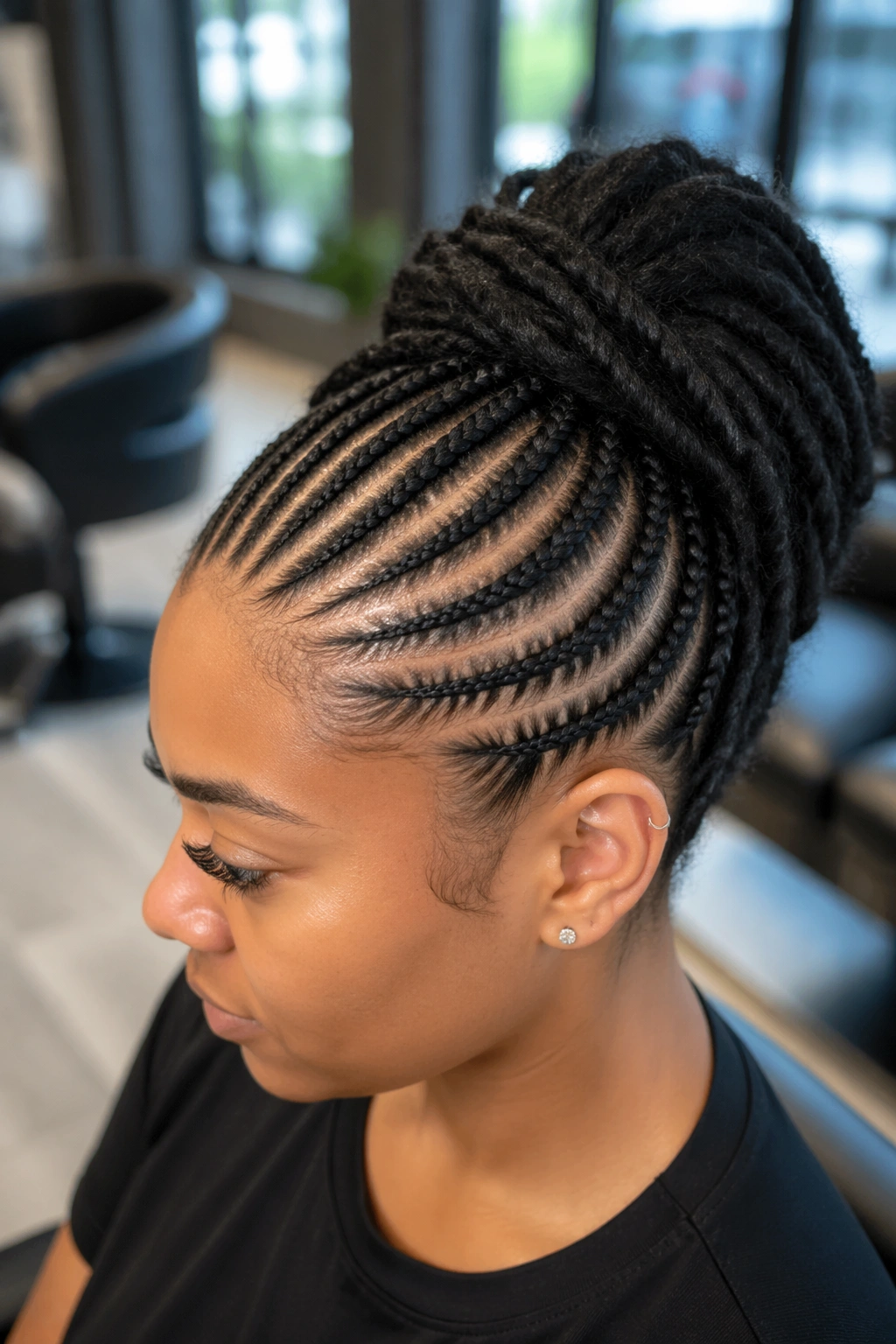 Real person with Cornrow Feed-In Ponytail Base showing neat cornrows and elevated ponytail