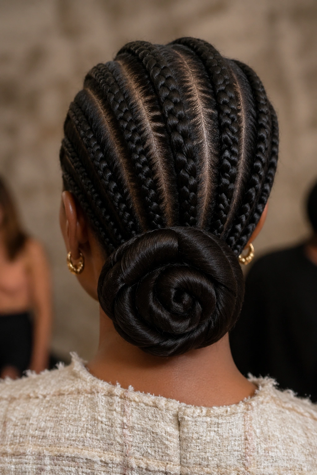 Close-up of a real Black woman with a large pinned curl at the nape
