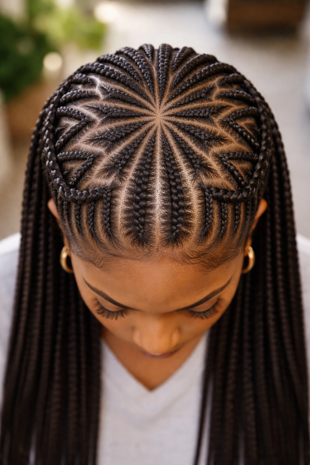 Top-down view of crown-only zigzag halo on a real person's head in a salon