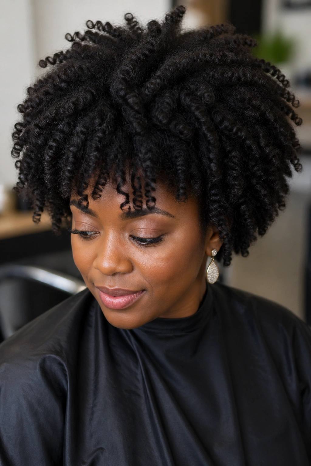 Portrait of a real woman showing curl patterns 3b-4c