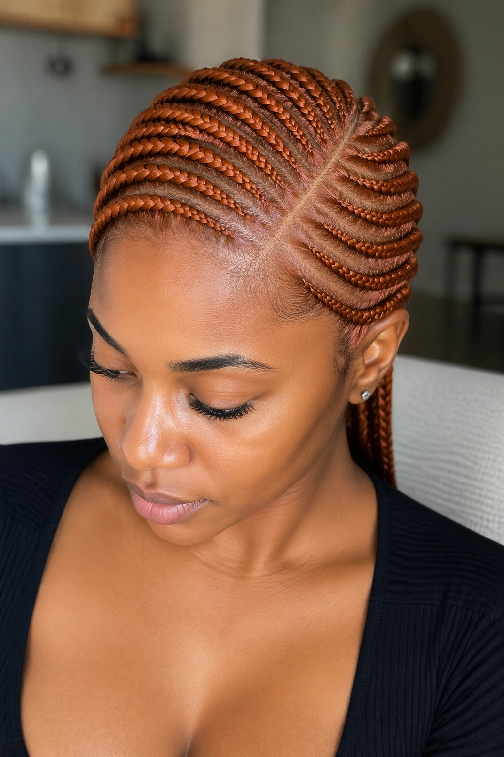 Ginger side-parted cornrows on a real woman with a deep side part in natural light