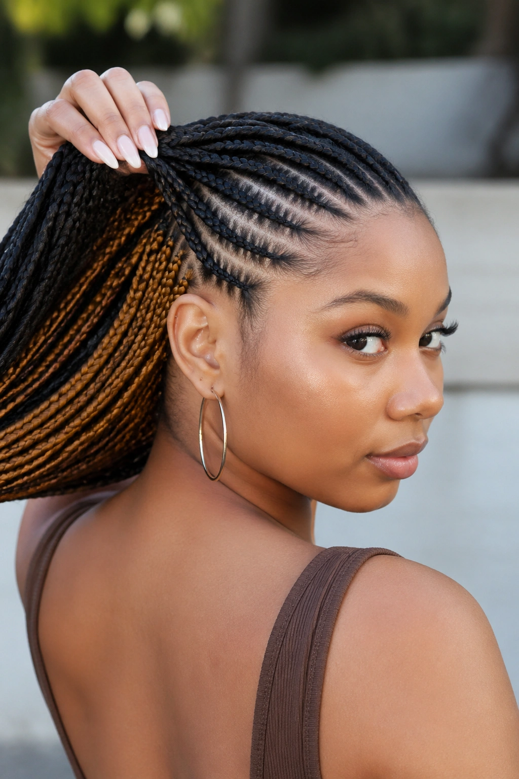 Portrait highlighting dramatic top versus underlayer hair color contrast.