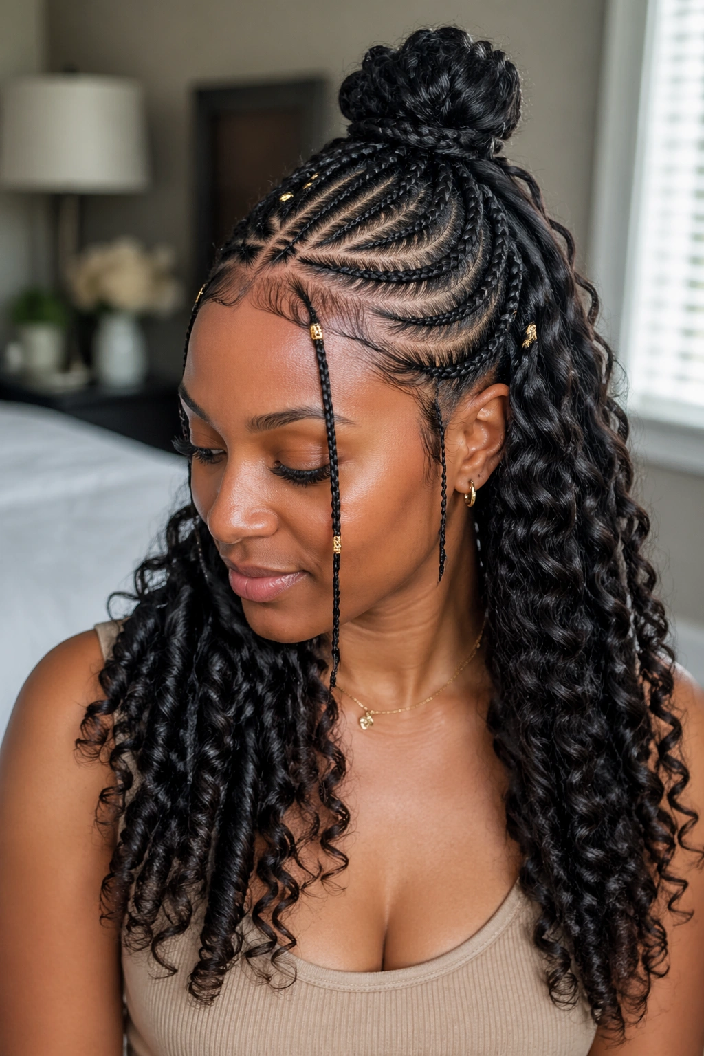 Real woman with half-up Fulani bun and loose curls cascading down.