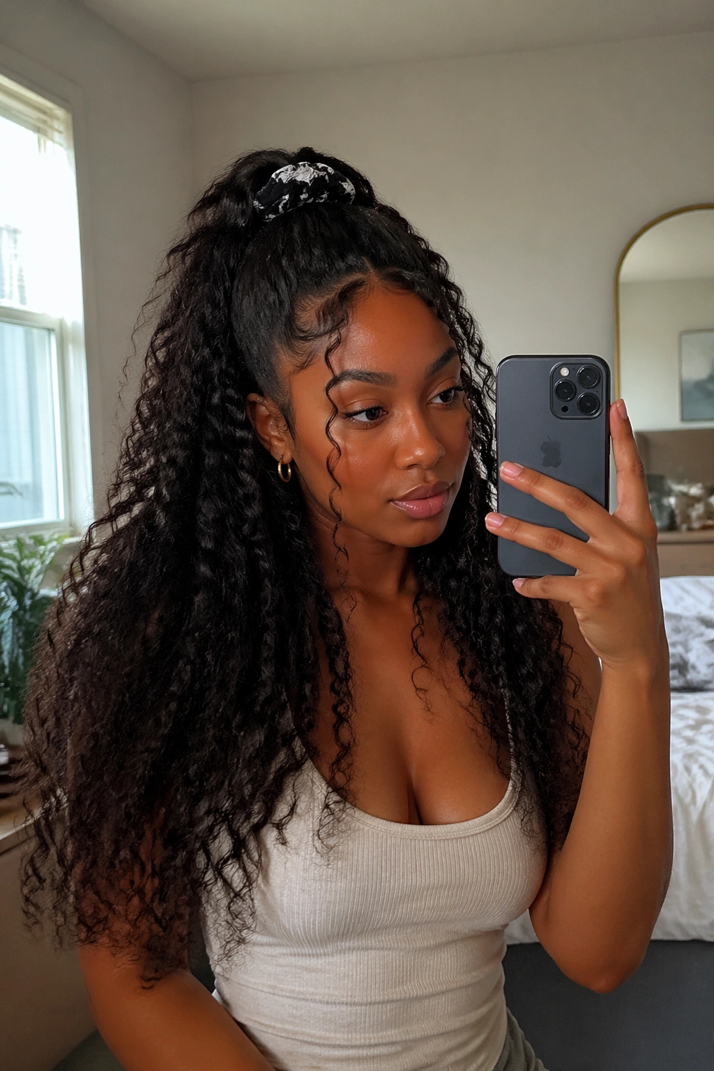 Mirror-selfie half-up half-down curly frontal