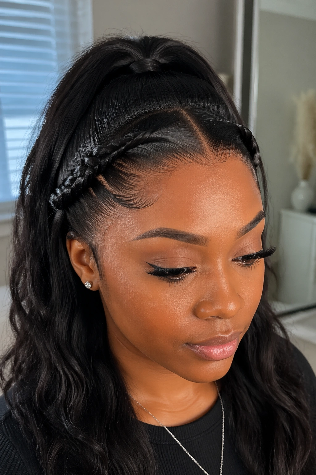 Real woman wearing half-up ponytail with twisted sides, visible twists