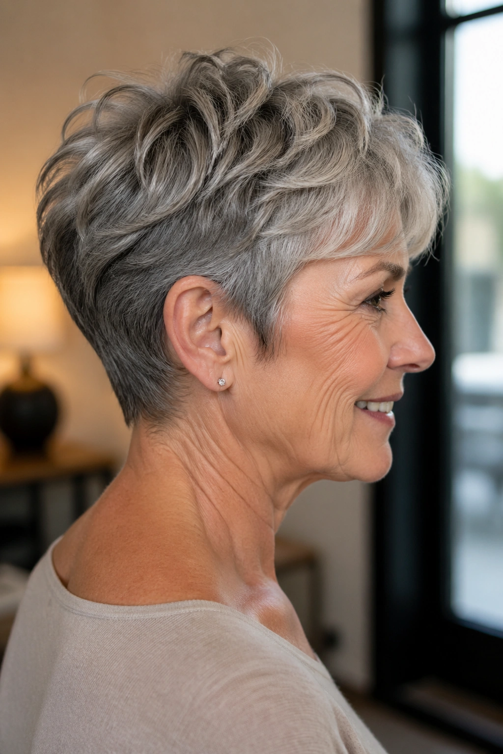 Real woman with layered crop and tapered nape, close-up