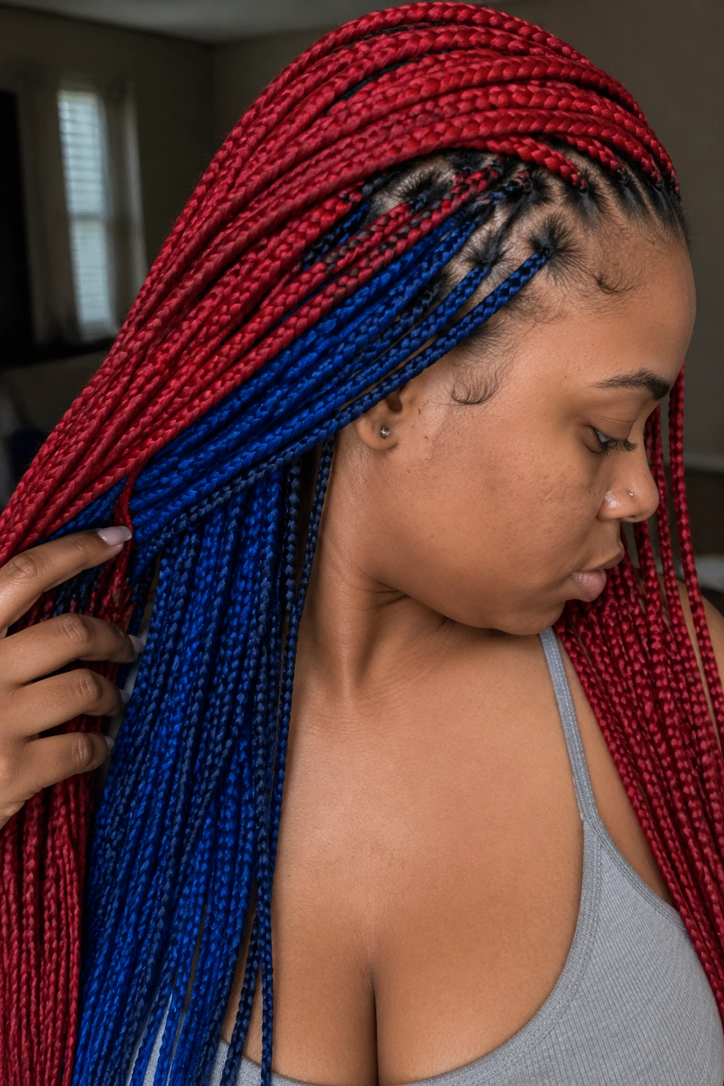 Real person with red braids showing blue underneath through peekaboo effect