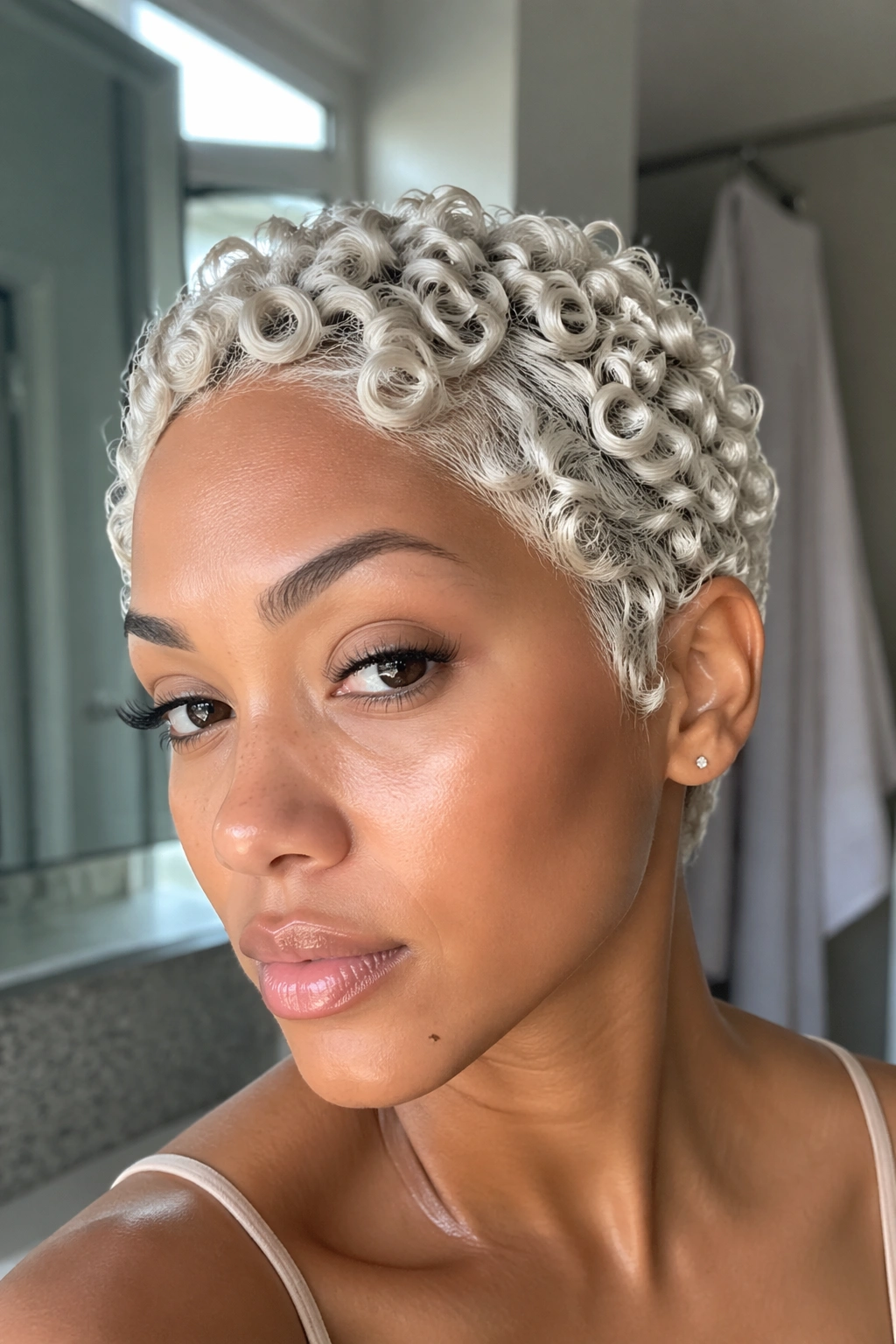 Close-up of platinum finger coils on a real person.