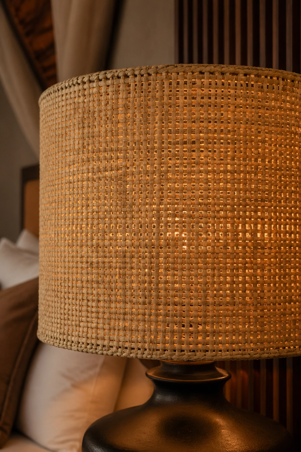 Lampshade made from raffia weaving with warm light.