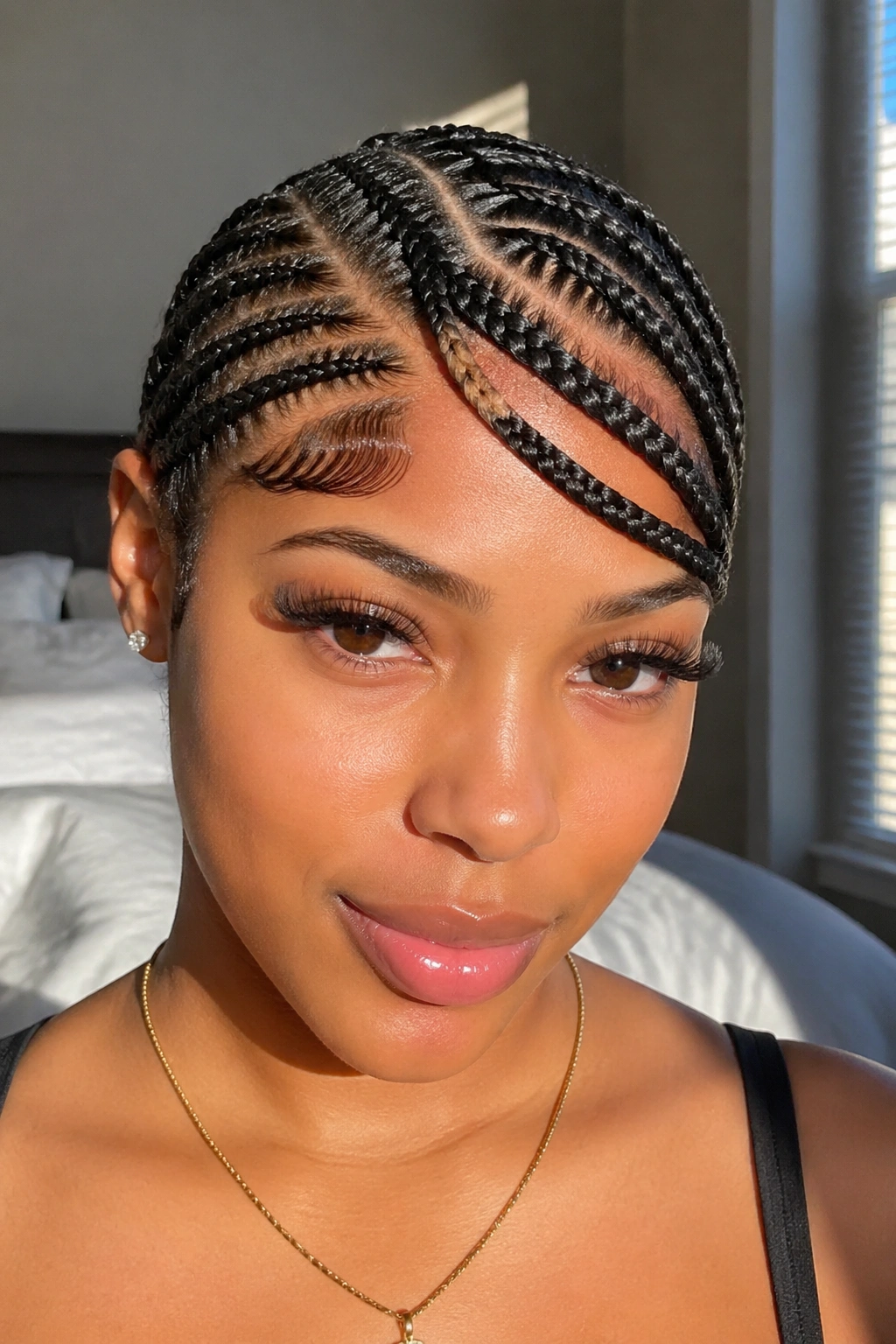 Close-up of side part cornrows with swoop on a real person