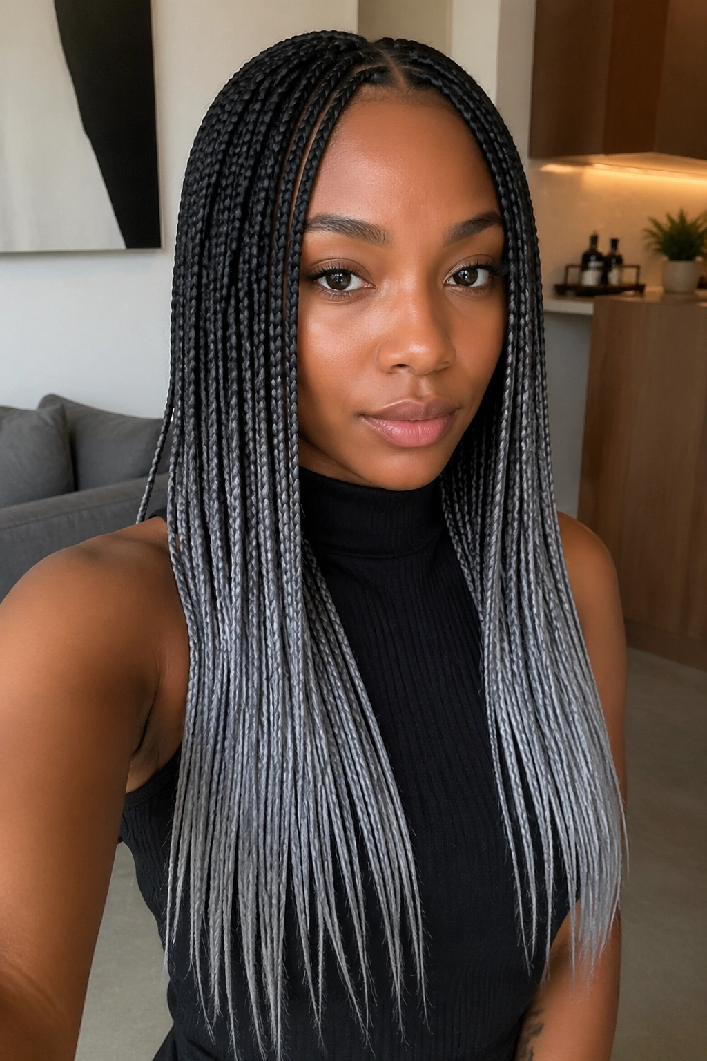 Close-up of smoky silver ends on micro braids on a real person