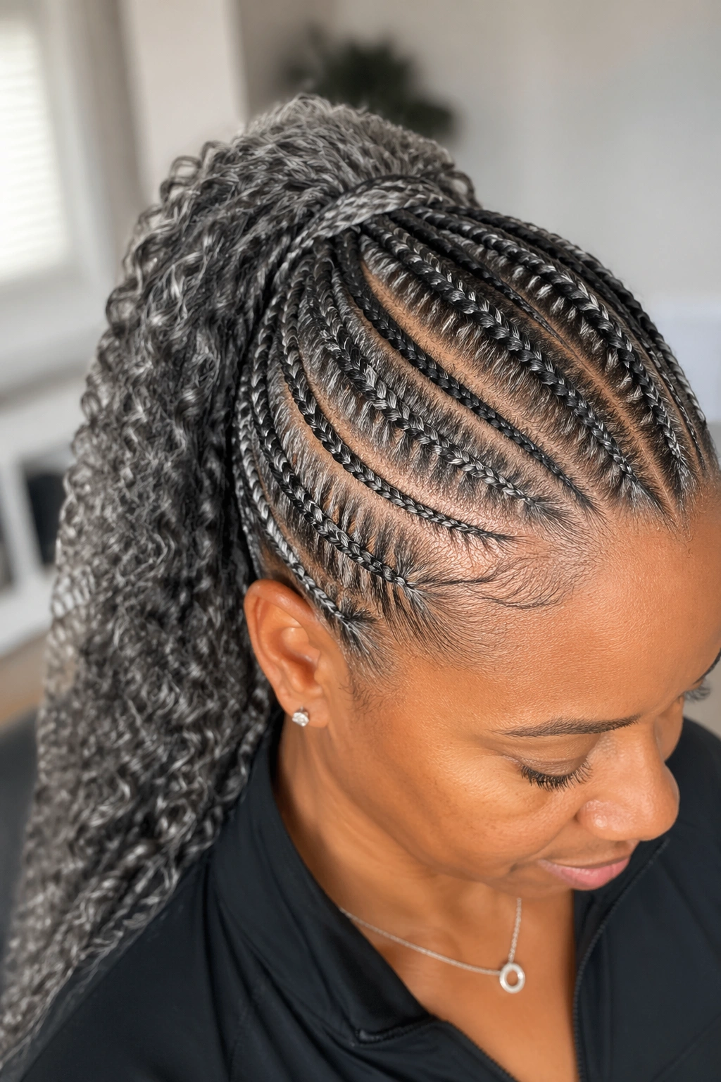 Close-up of a real woman with stitch cornrow ponytail and visible scalp pattern