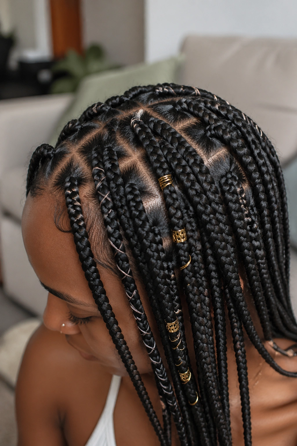 Close-up of knotless braids with thread wraps and accent wires