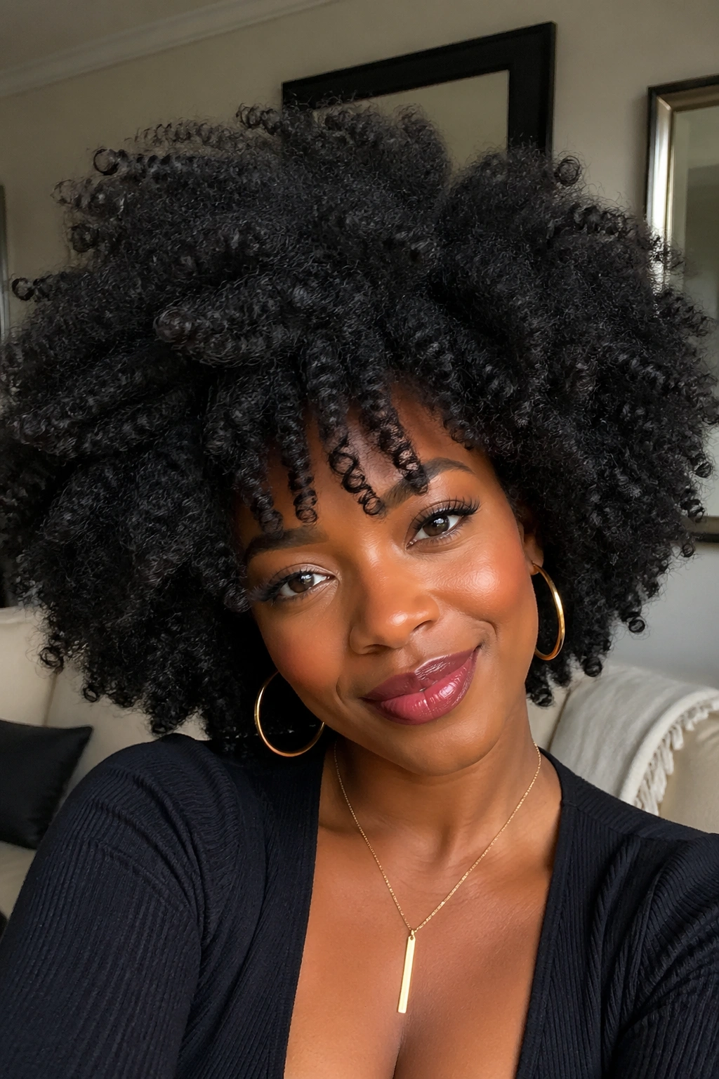 Real person with brushed-out twist-out Afro