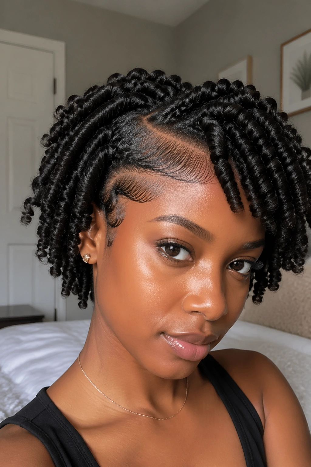 Close-up of a real woman's twist-out with defined edges along the hairline using edge gel.