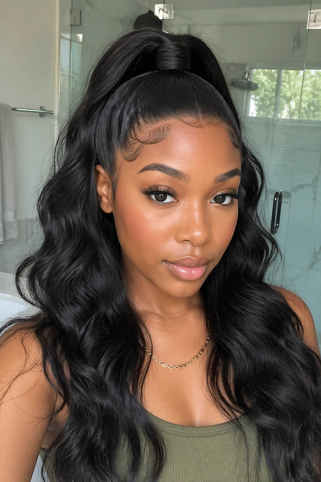 Real woman with wrapped-base high half pony hairstyle.