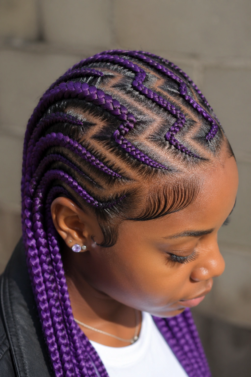 Zigzag purple cornrows on a real person