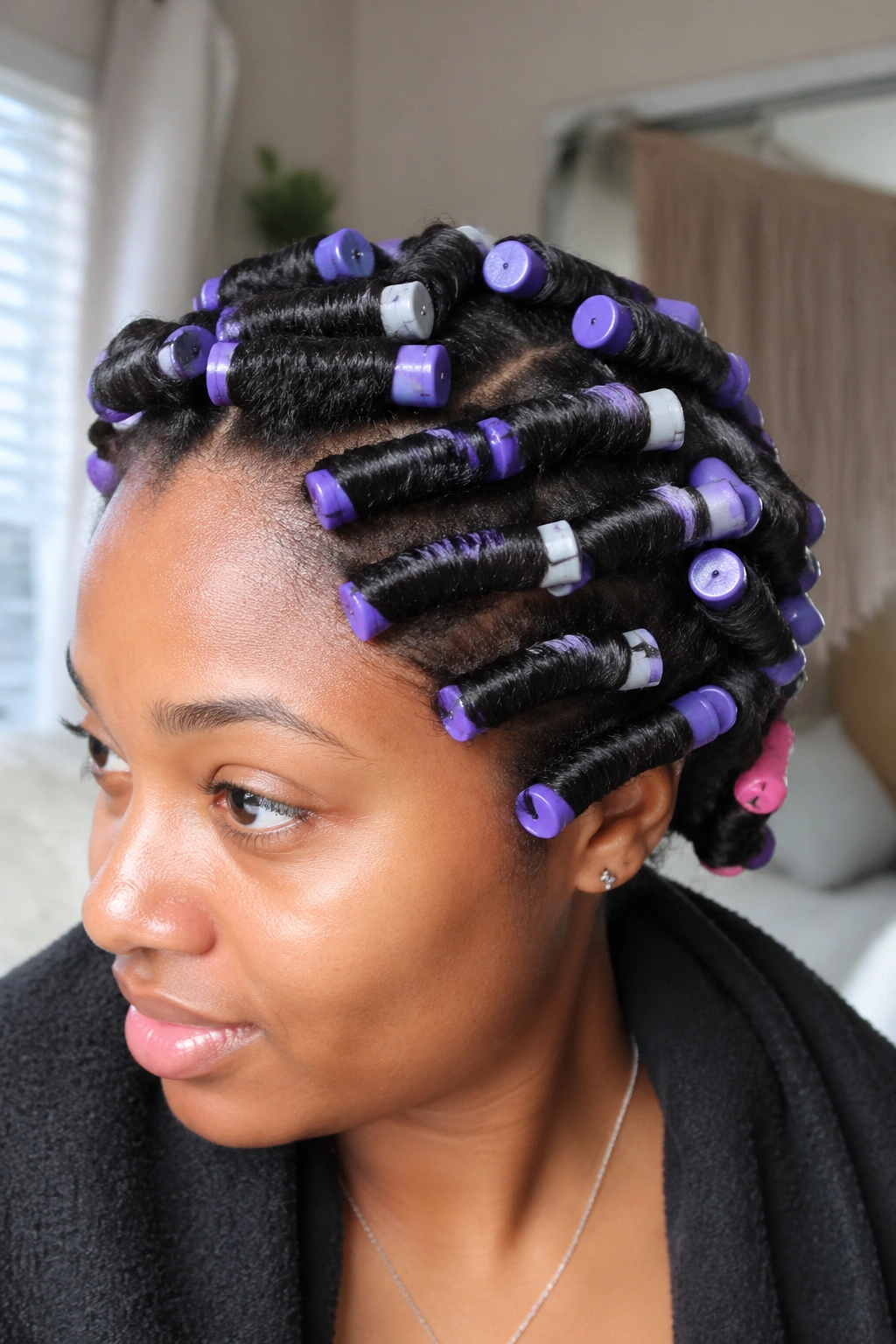 Close-up of 4C flexi rod set on a real person, hair with rods filling the frame