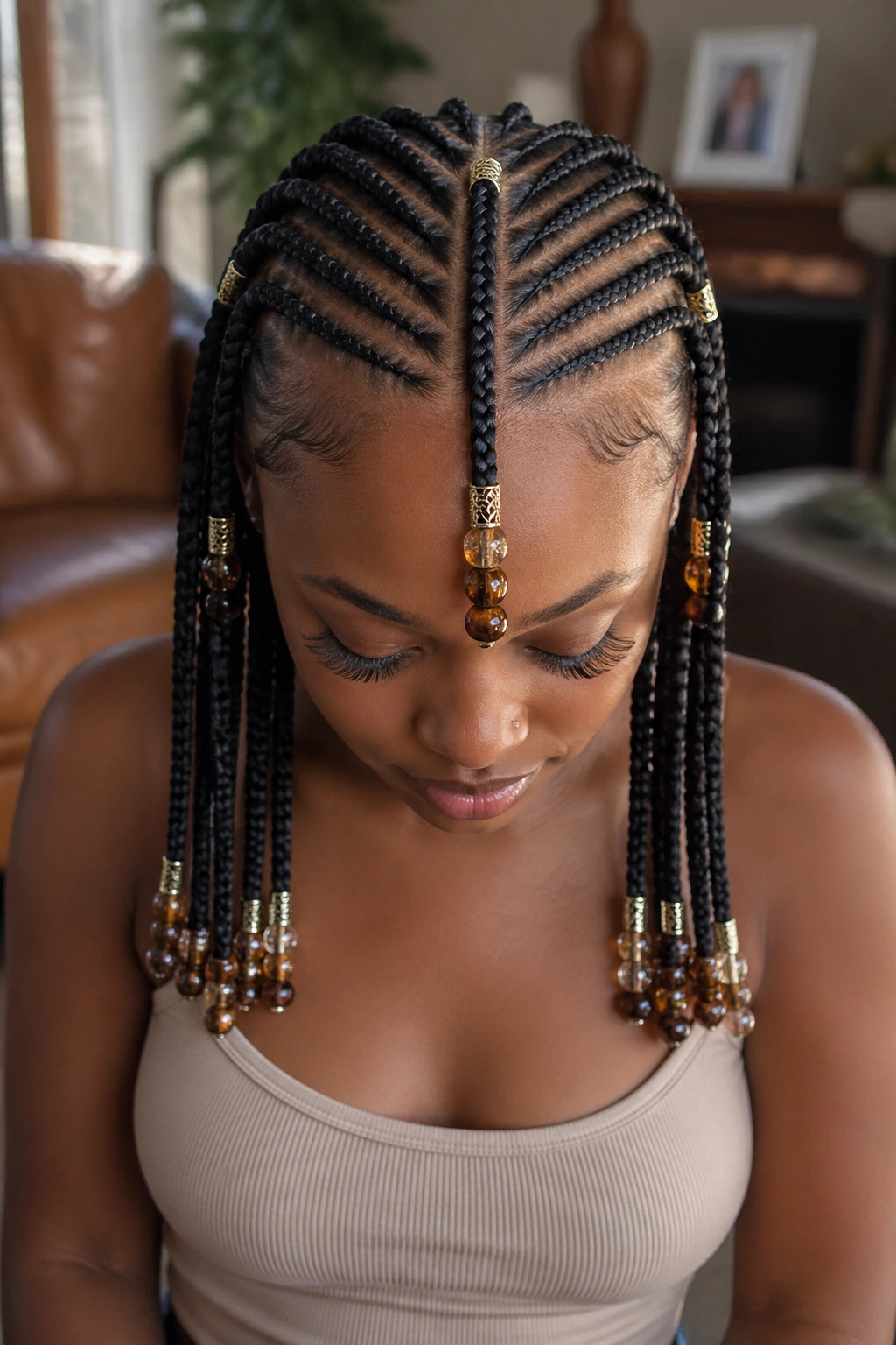 Close-up of real person with Fulani-inspired cornrows and bead accents