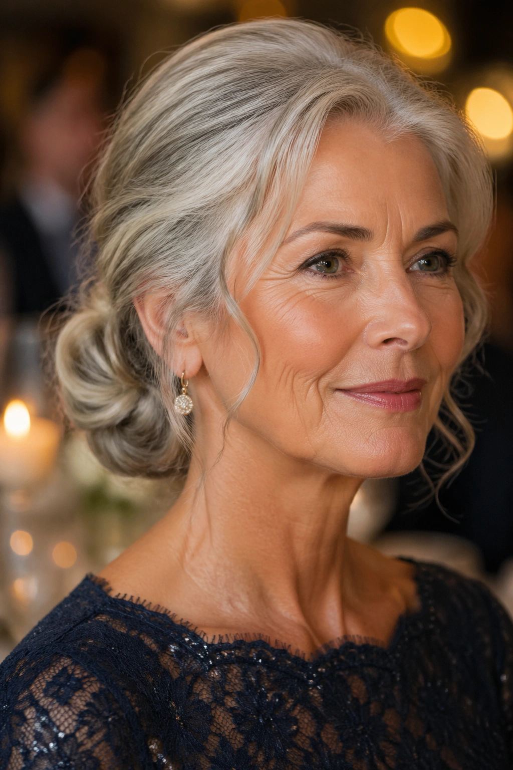 Close-up of a real woman with a low chignon and soft ends hairstyle