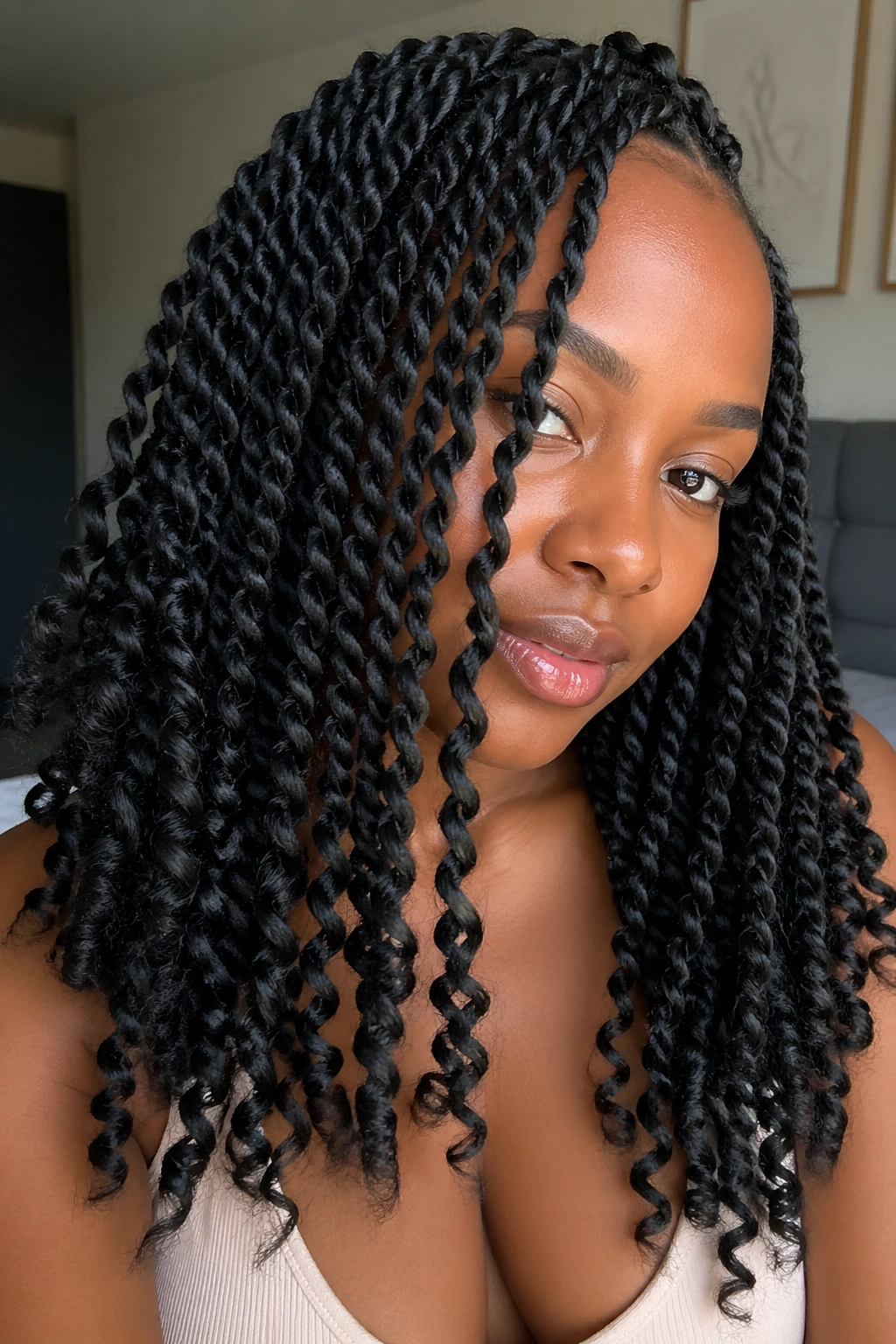 Close-up of Marley Twists with curled ends on a real woman
