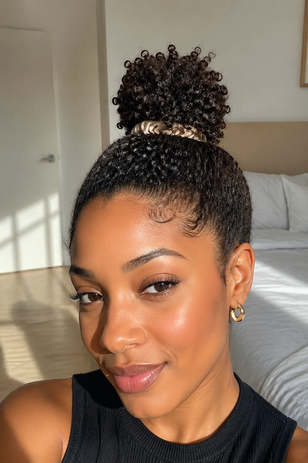 Close-up of a real woman with a sculpted pineapple hairstyle on top of the head