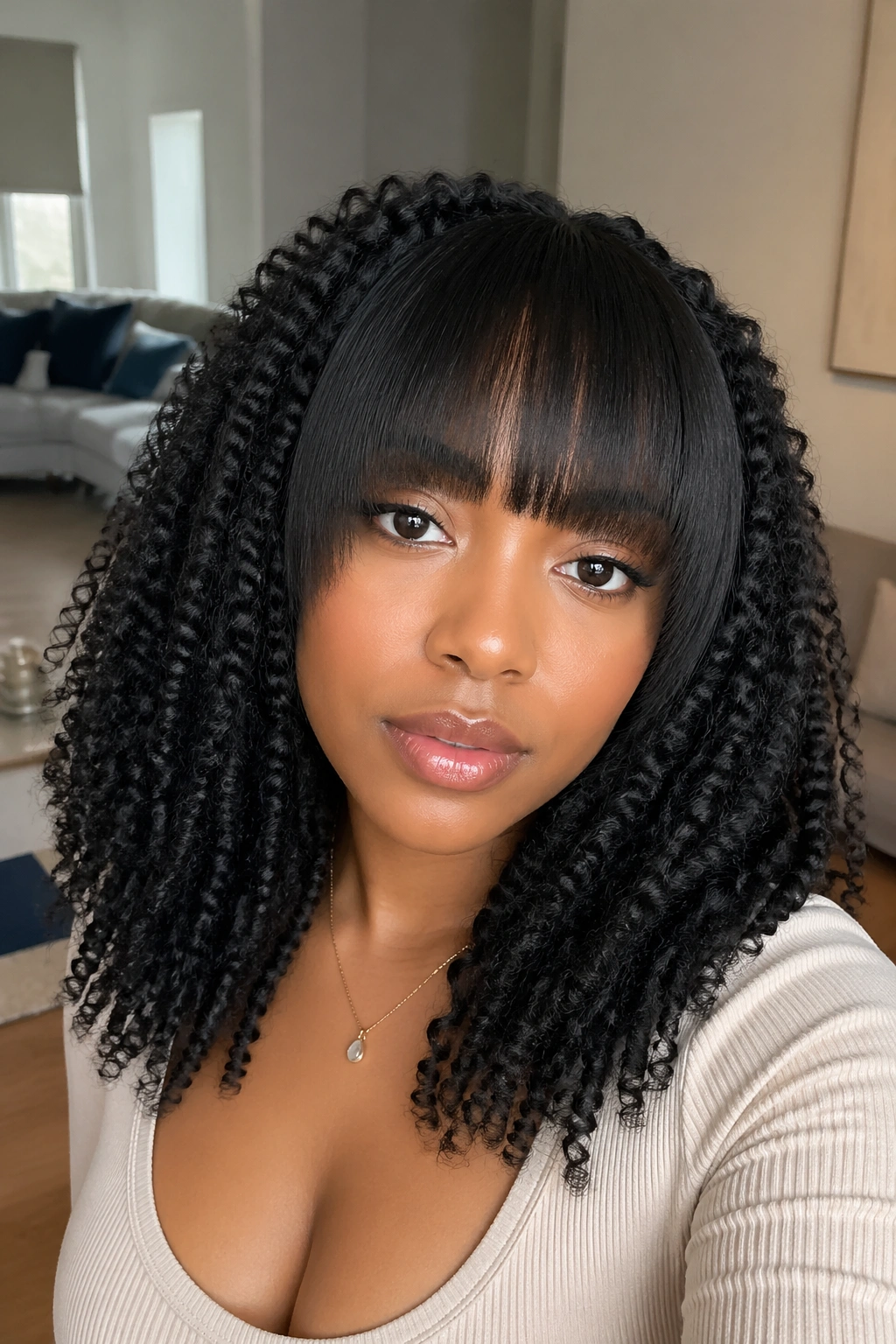 Close-up of a woman with straight bang and twist-out body hair
