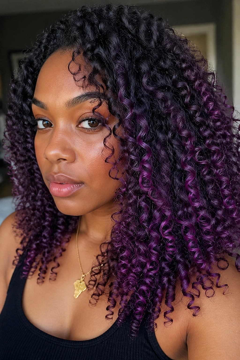 Close-up of violet balayage on 3C ringlets with gradient color